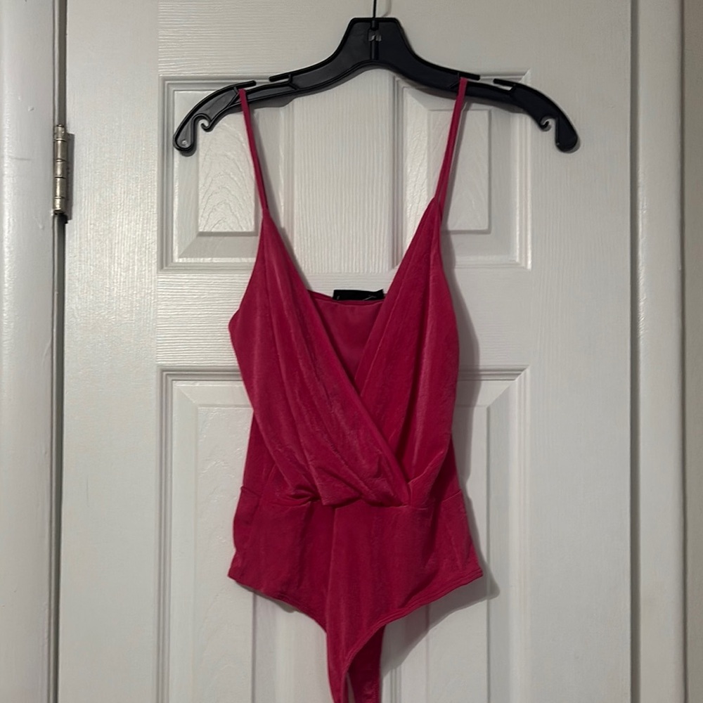 Pink body suit